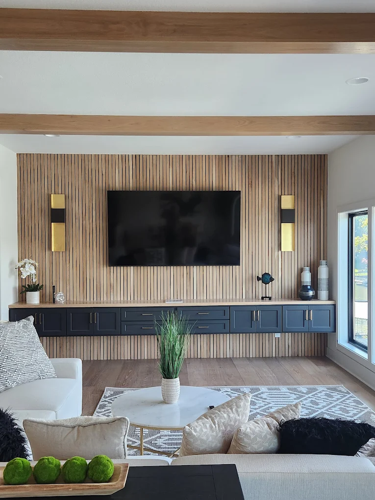 Custom navy media built-in with wood slat wall